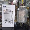 00441 8l single glass juice dispenser on metal rack